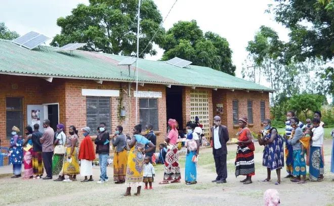 people in line outside a building