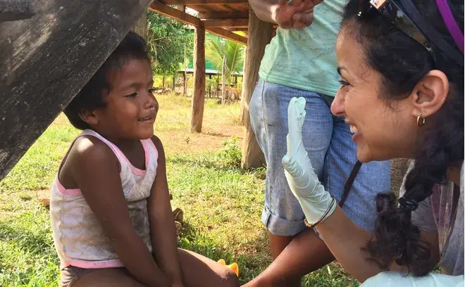 Child and smiling woman